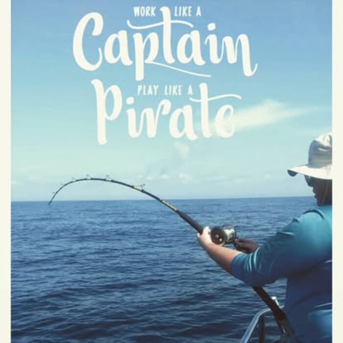 An angler fighting a fish with a bent rod out on the Gulf